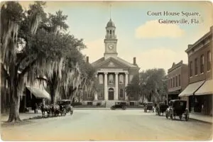 Hand-tinted postcard-style illustration of the courthouse square in Gainesville, Gainesville, Florida, in the style of about 1910